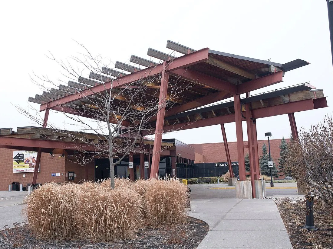Red steel entrance canopy of Casino Ajax